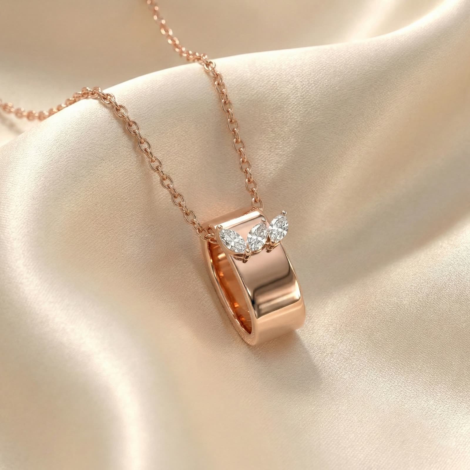 AI jewellery design: Rose gold band pendant with three marquise diamonds on satin