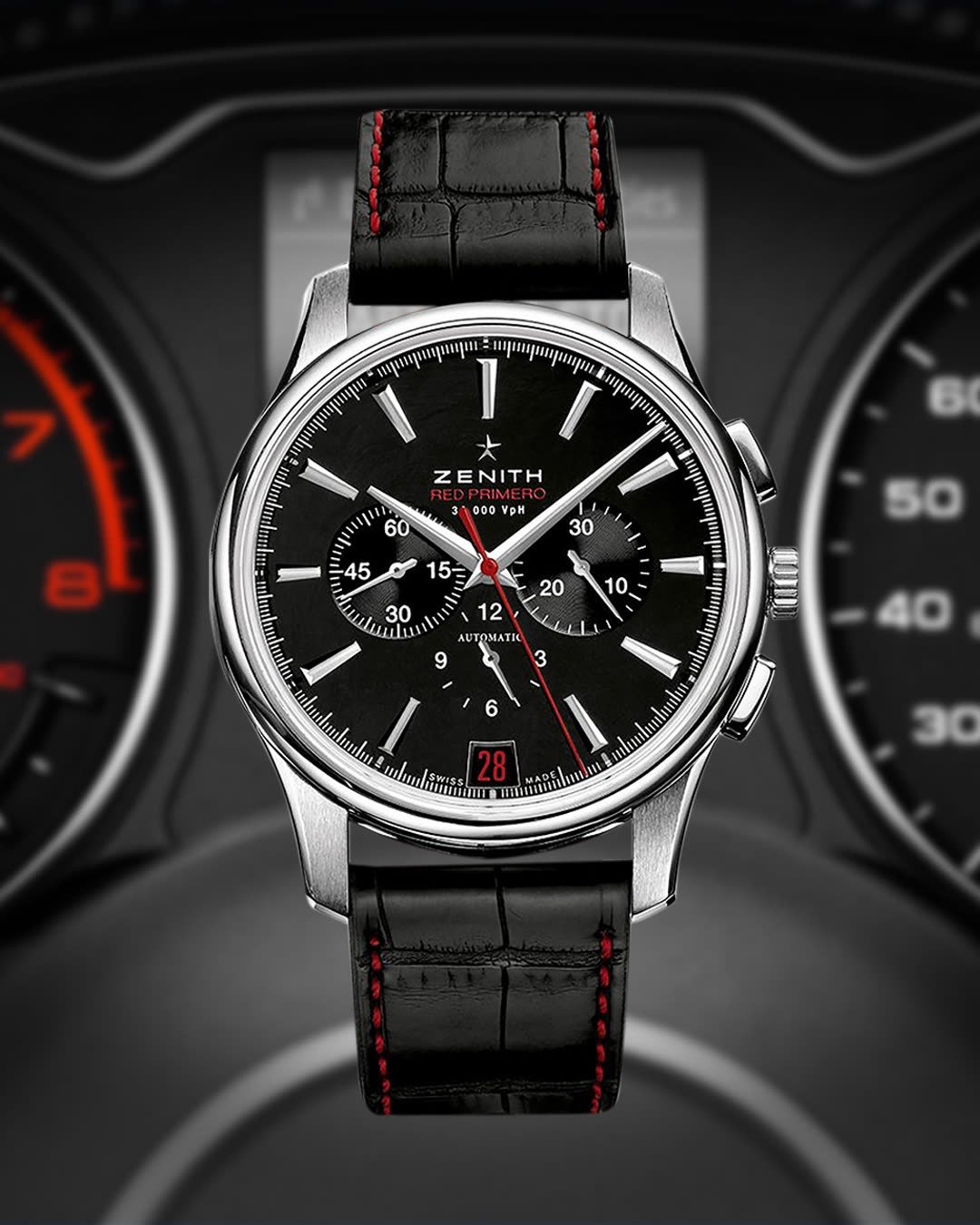 Luxury watch design: Black chronograph watch in front of a car dashboard