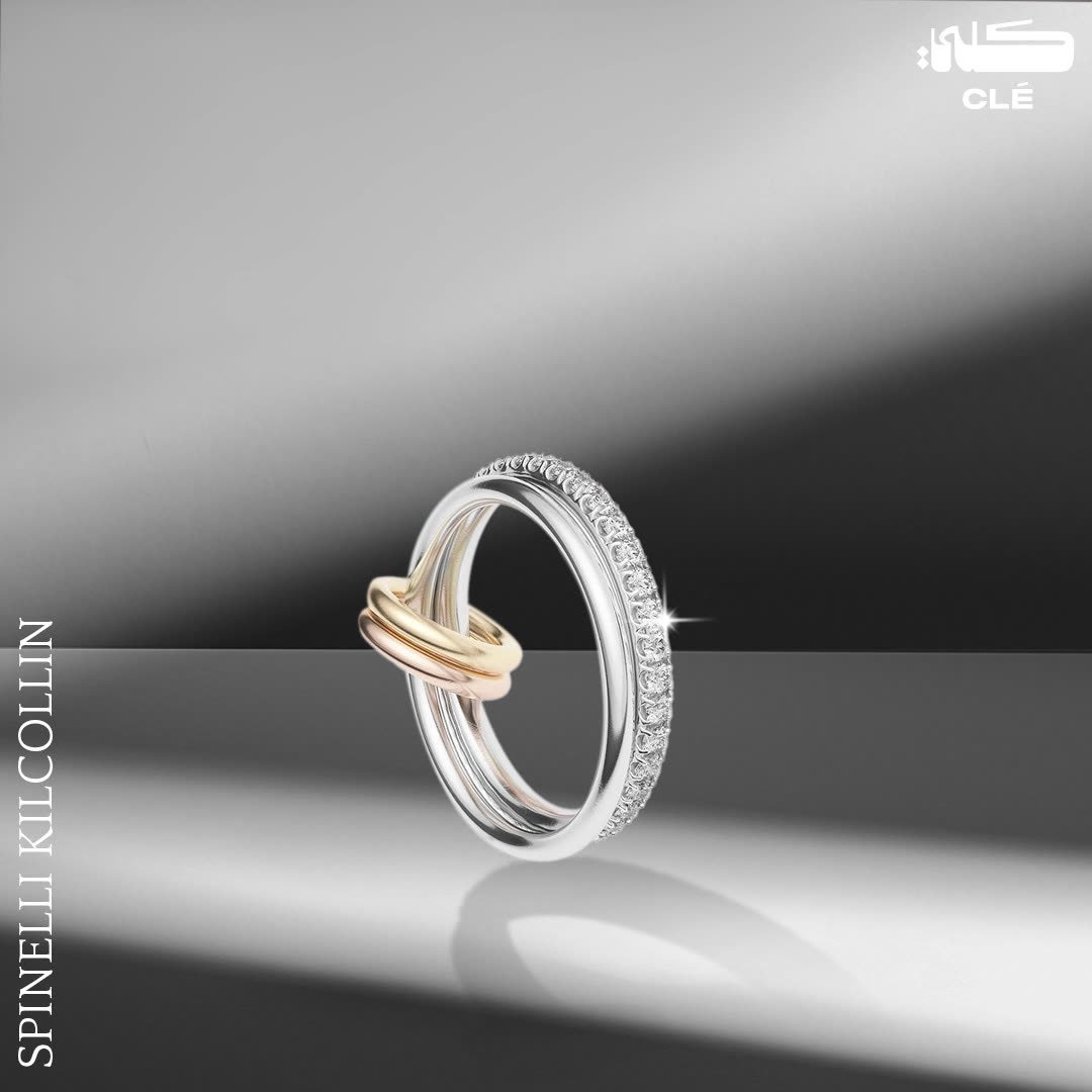 Luxury jewellery design: Linked gold and diamond ring in light and shadow