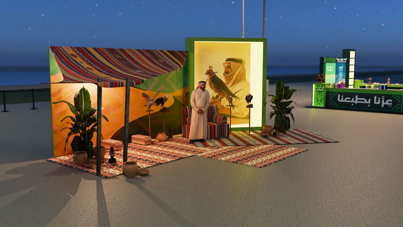KJO National Day event: Majlis corner with a falconry portrait and traditional seating